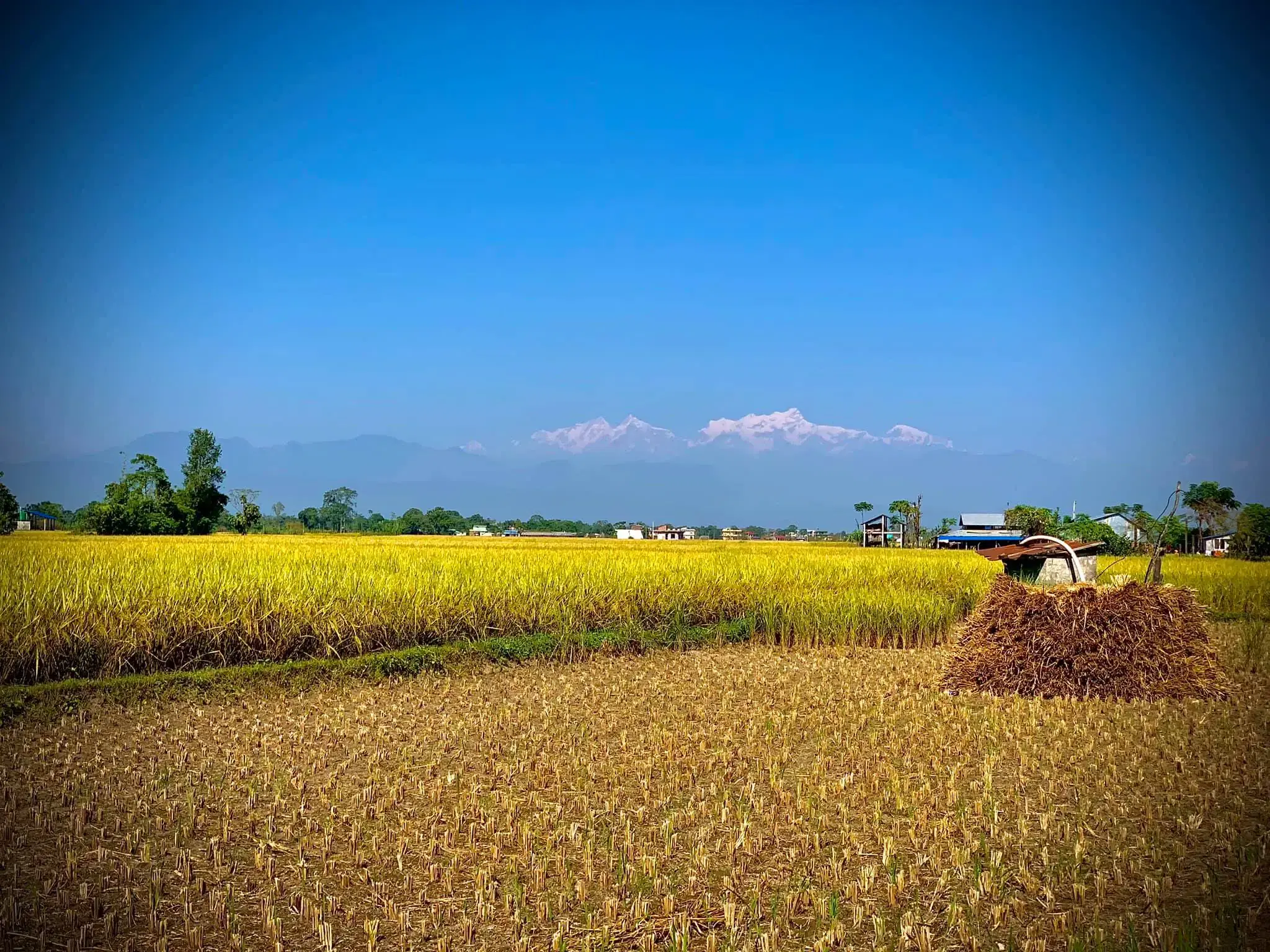 Mountain landscape featuring rocky terrain and cloudy sky.