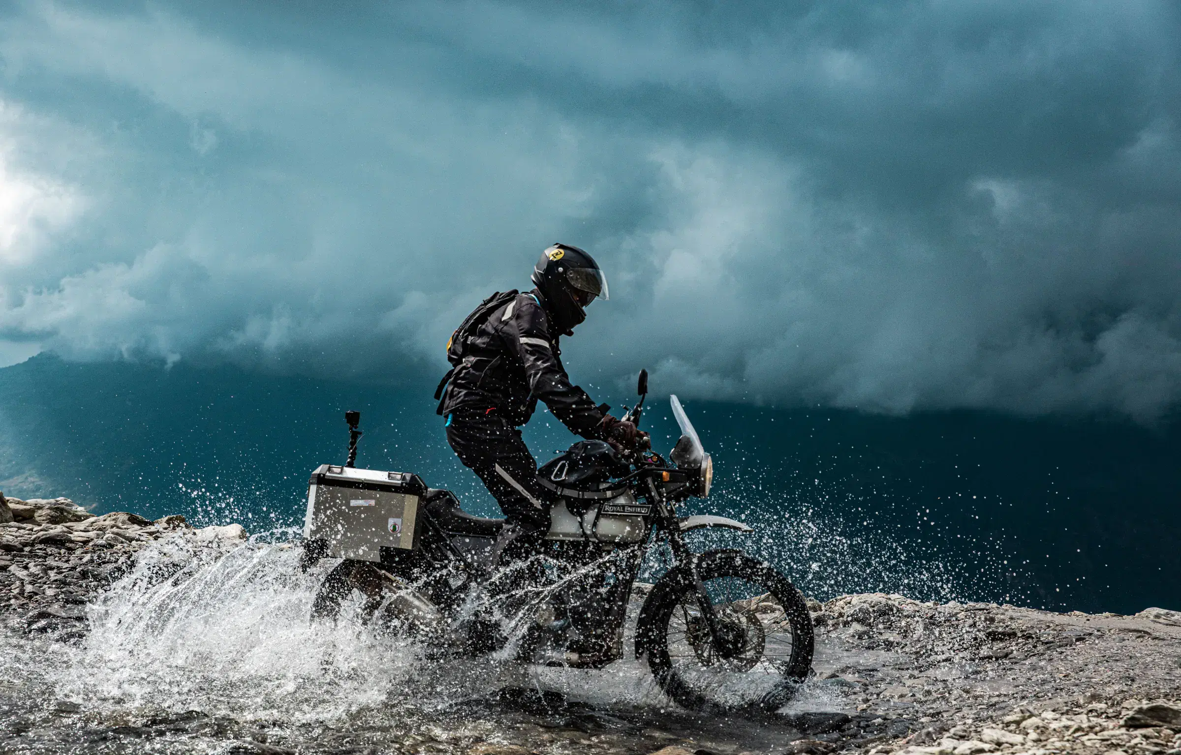 Outdoor scene featuring people and cloudy sky.