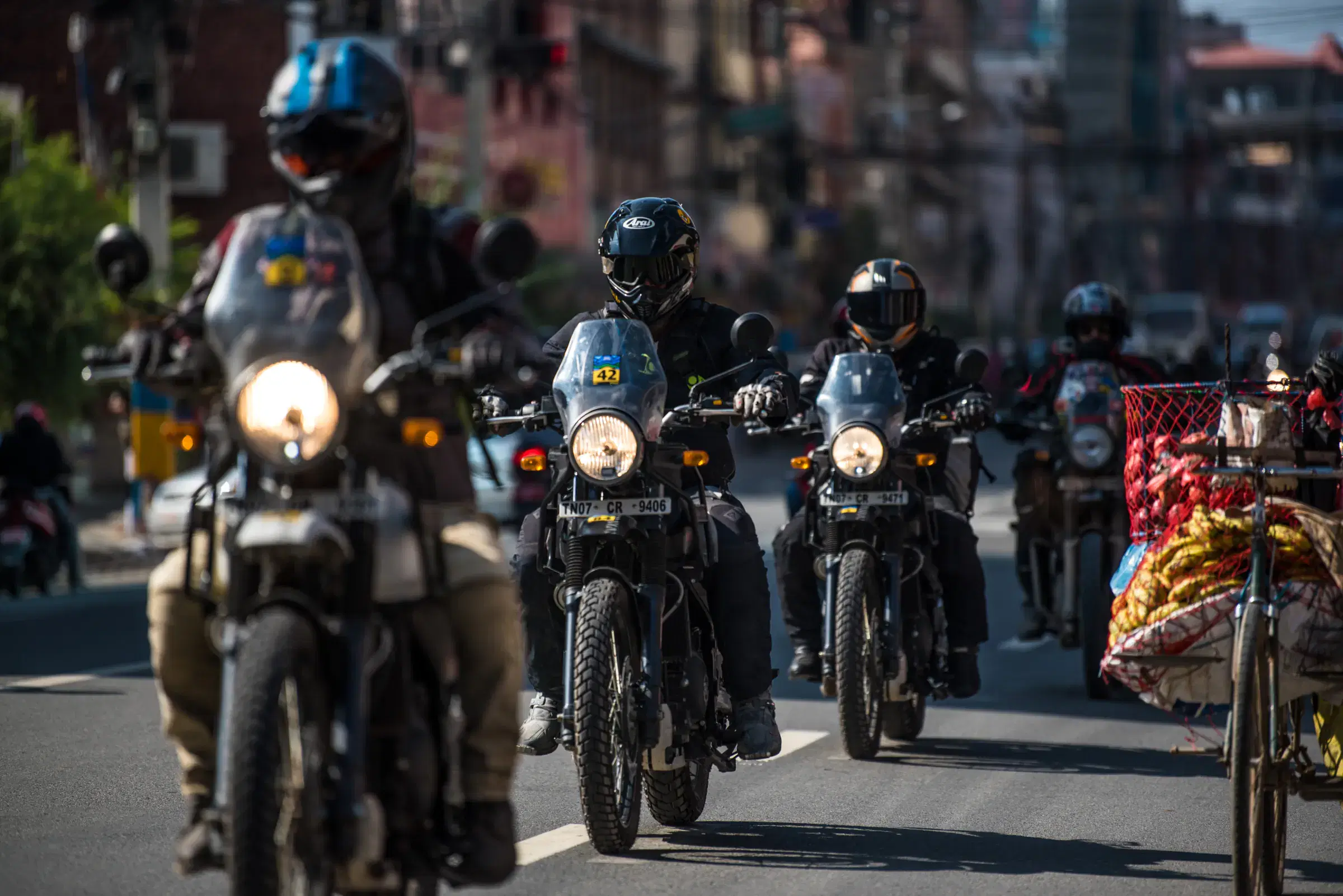 Outdoor adventure scene featuring people and a vehicle.