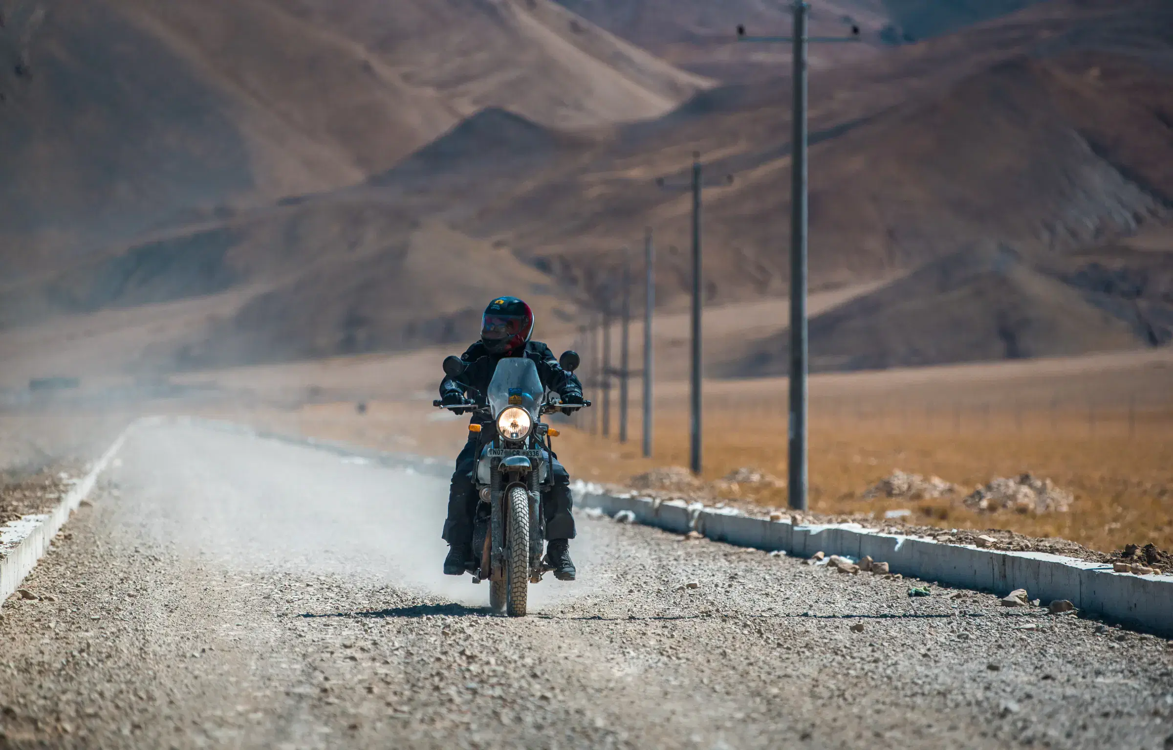 Outdoor scene featuring people and water.