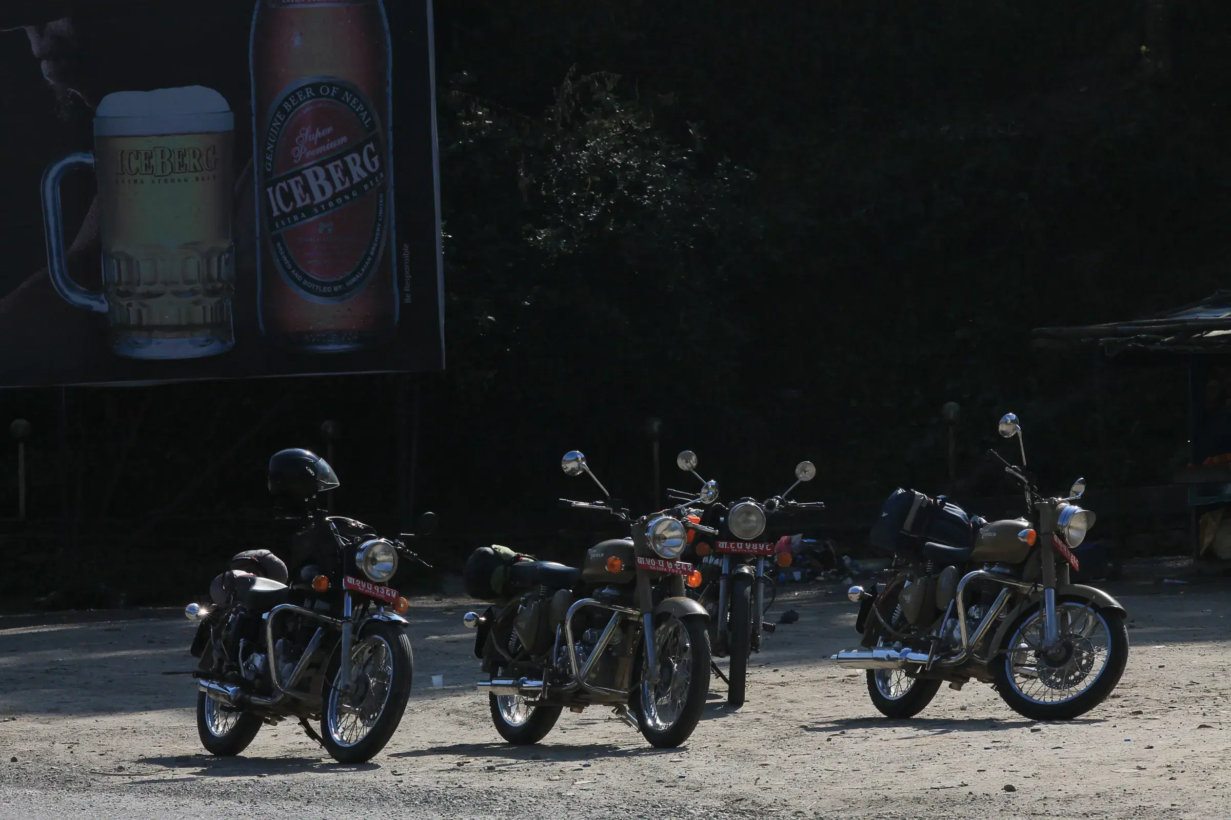 Outdoor adventure scene featuring people and a vehicle.